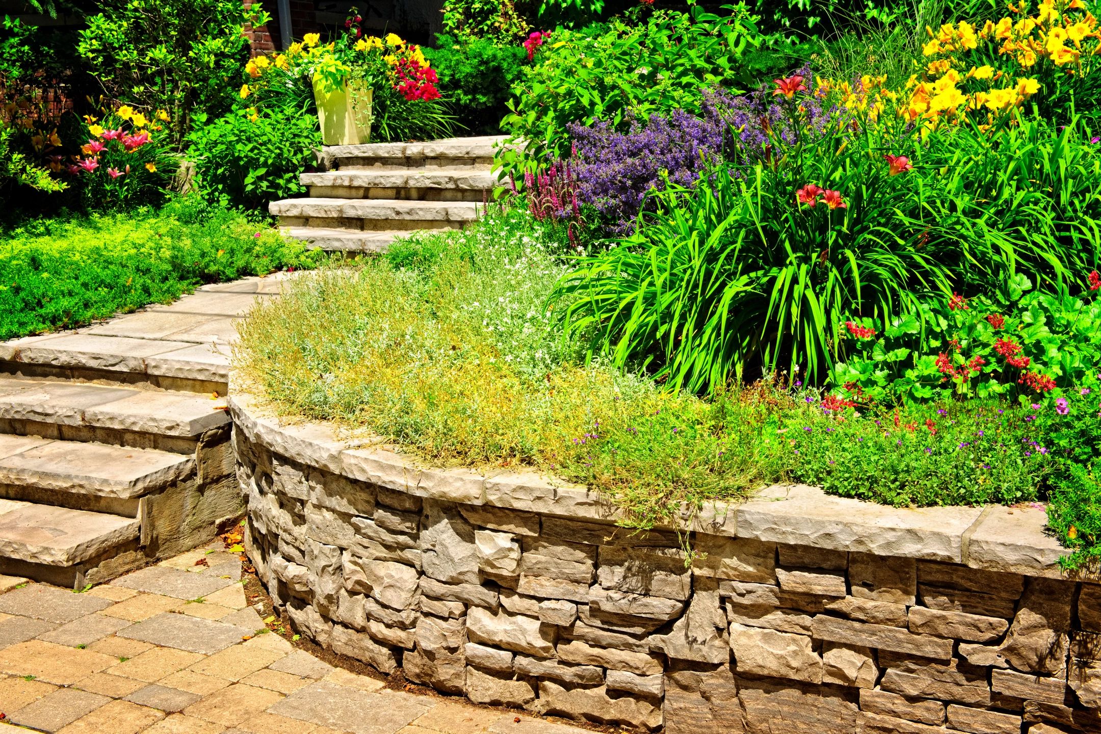 Services for your home and business garden - retaining wall and stone staircase.