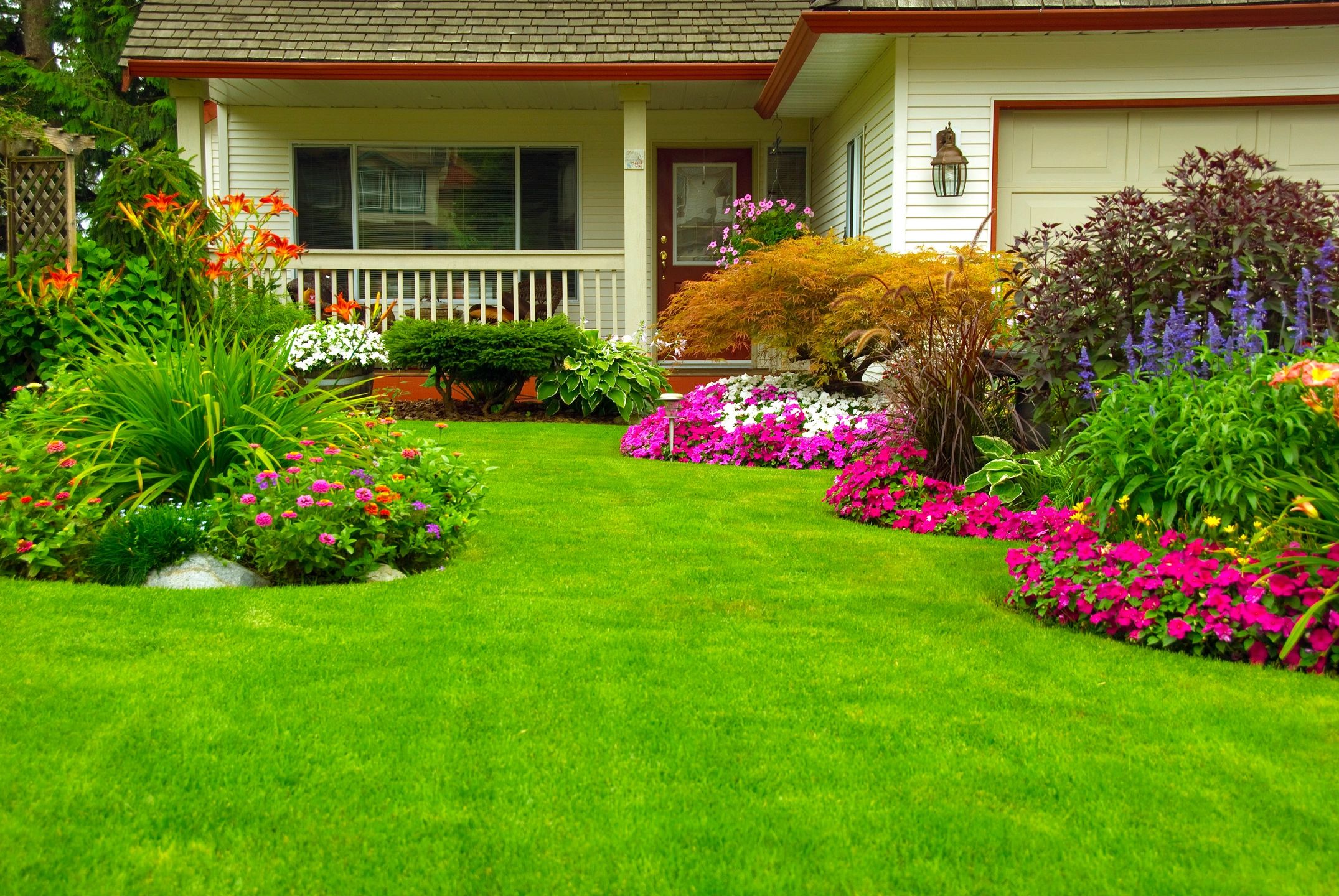 Beautiful front yard garden with flowers and shrubs in Maryland, USA