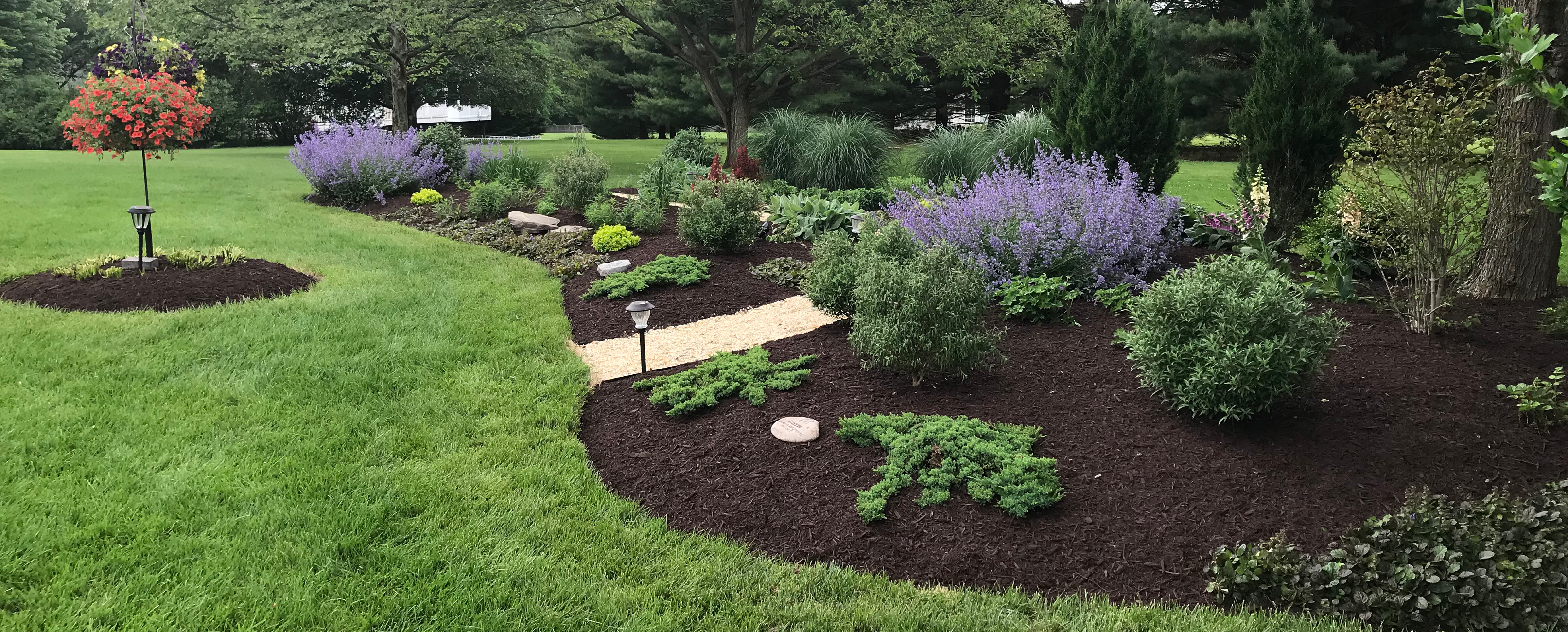 A tranquil garden with features of the Maryland region; An example of a design project by Greenstone Landscape Inc.